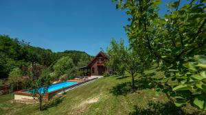 Bazén v ubytování Holiday home Romana nebo v jeho okolí