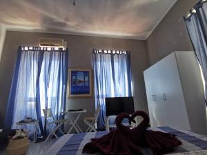 TV a/nebo společenská místnost v ubytování Chafbius