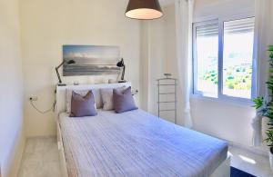 A bed or beds in a room at Valle Romano golf resort Capitolio Estepona