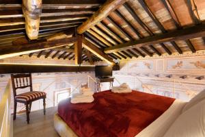 Posteľ alebo postele v izbe v ubytovaní Domus Nannini SPA - Palazzo Nannini