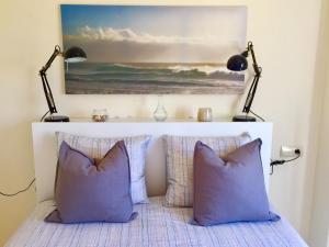 A bed or beds in a room at Valle Romano golf resort Capitolio Estepona