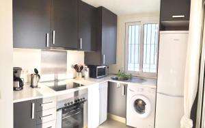 A kitchen or kitchenette at Valle Romano golf resort Capitolio Estepona