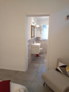 a bathroom with a sink and a toilet at The judas trees in Mestre