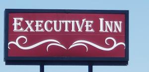Un certificat, premiu, logo sau alt document afișat la Executive Inn +2 fotografii