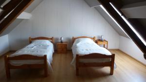 Llit o llits en una habitació de La Maison de Ners