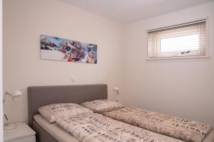 เตียงในห้องที่ Santvort Luxury Apartment with Private Parking