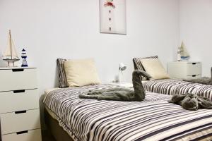 Posteľ alebo postele v izbe v ubytovaní Brilliant 2BDR Apartment