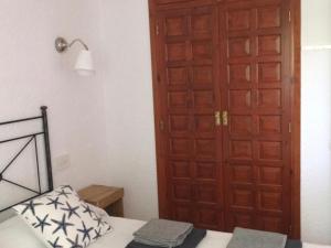 Posteľ alebo postele v izbe v ubytovaní OASIS