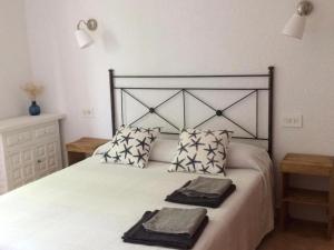 Posteľ alebo postele v izbe v ubytovaní OASIS