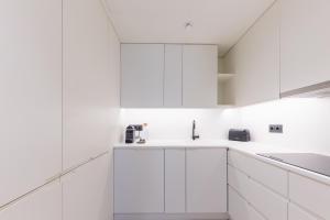 Kuchyň nebo kuchyňský kout v ubytování BessaApartments + 42 fotografií