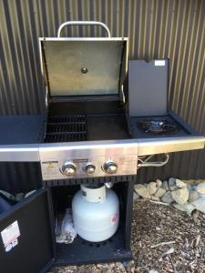 a stove top oven sitting on top of a counter at The Nook in Arthur's Pass