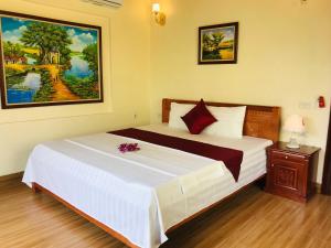 Säng eller sängar i ett rum på Tam Coc Thai Duong Homestay