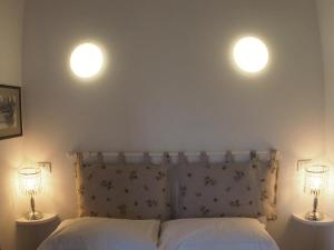Łóżko lub łóżka w pokoju w obiekcie Casa Vacanze Bungalow I Girasoli