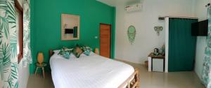 Postel nebo postele na pokoji v ubytování Carpe Diem Residence