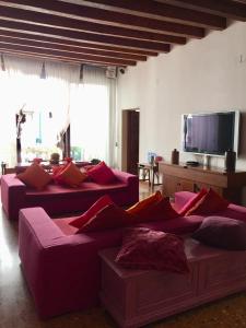 TV a/nebo společenská místnost v ubytování Uma Apartments