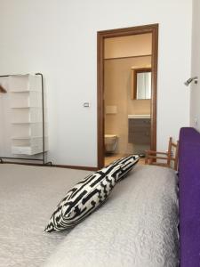 Postel nebo postele na pokoji v ubytování Uma Apartments