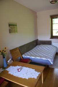 
A bed or beds in a room at Nowe Grochale 12 B
