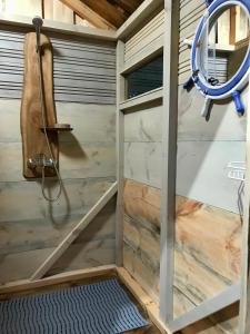 a shower in a tiny house at Saare Glamping Dome House in Salme