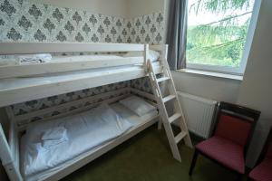 Posteľ alebo postele v izbe v ubytovaní 4family *RESORT*SPA*