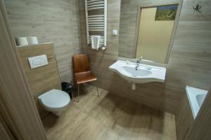 Kúpeľňa v ubytovaní 4family *RESORT*SPA*
