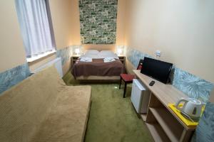 Posteľ alebo postele v izbe v ubytovaní 4family *RESORT*SPA*