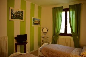 TV a/nebo společenská místnost v ubytování A Casa di Laura