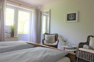מיטה או מיטות בחדר ב-Hotel Gasthuus Spieskamer