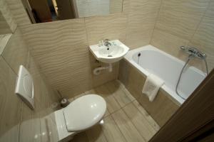 Kúpeľňa v ubytovaní 4family *RESORT*SPA*