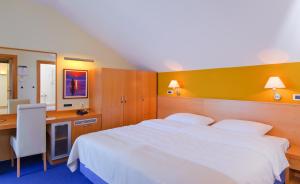 Letto o letti in una camera di Hotel Saudade