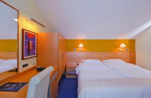 Letto o letti in una camera di Hotel Saudade