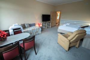 Posteľ alebo postele v izbe v ubytovaní 4family *RESORT*SPA*