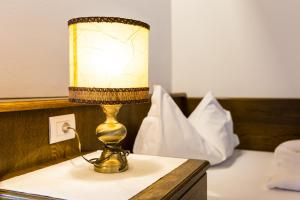 Letto o letti in una camera di Hotel Weisses Lamm