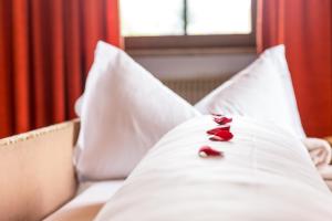 Letto o letti in una camera di Hotel Weisses Lamm