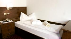 Letto o letti in una camera di Hotel Weisses Lamm