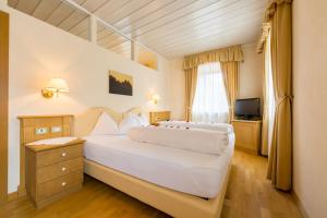 Letto o letti in una camera di Hotel Weisses Lamm