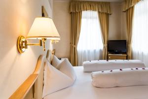 Letto o letti in una camera di Hotel Weisses Lamm