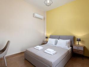 Posteľ alebo postele v izbe v ubytovaní Agapi's Home
