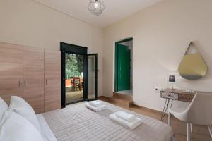 Posteľ alebo postele v izbe v ubytovaní Agapi's Home