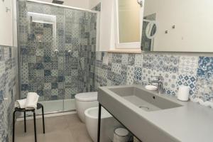 Koupelna v ubytování Residence Montelci + 37 fotografií
