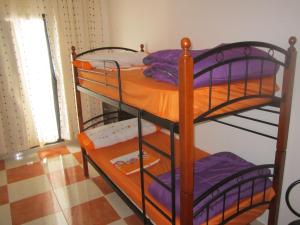 a bedroom with two bunk beds in a room at Apartamentos Venta Don Quijote in Almagro +48 photos