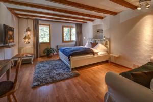 Postel nebo postele na pokoji v ubytování Hotel Seehof-Arosa