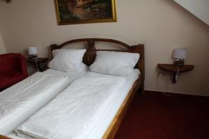 Postel nebo postele na pokoji v ubytování Hotel Gardenia