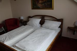 Postel nebo postele na pokoji v ubytování Hotel Gardenia
