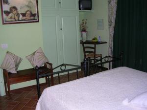 Postel nebo postele na pokoji v ubytování Giannetti Bed & Breakfast