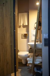 Ванная комната в Jurnal Hotel