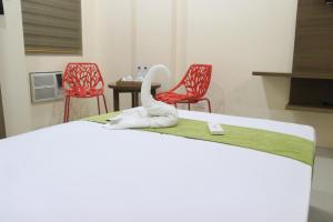 Letto o letti in una camera di RNR Suites