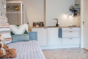Kuchyň nebo kuchyňský kout v ubytování KaksTeist Apartments