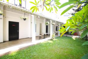 Zahrada ubytování Clock Inn Dehiwala