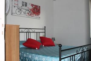 A bed or beds in a room at Affittacamere Piagge