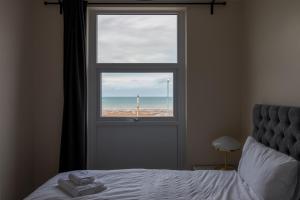 Granada Apartments Queen's Promenade客房内的一张或多张床位